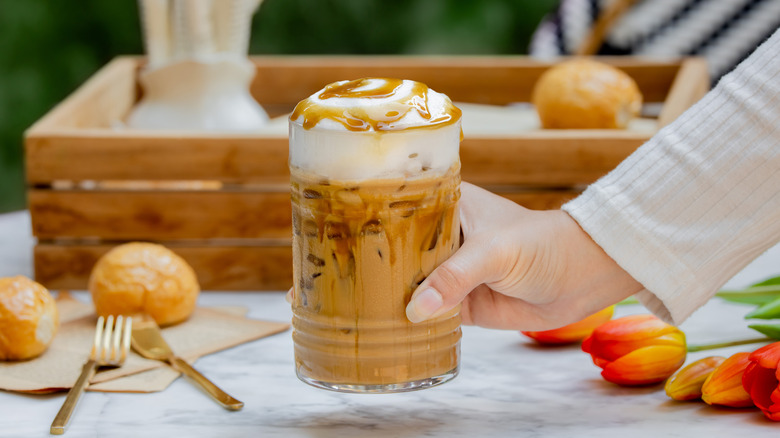 iced caramel macchiato on table