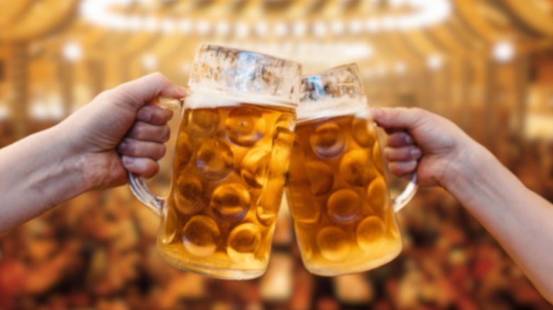 Oktoberfest mugs clinking