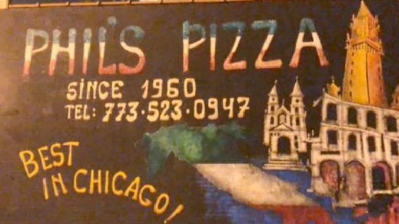 The mural outside Phil's Pizza