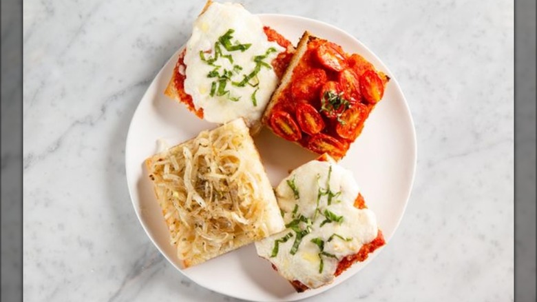 Plate of various focaccia pizzas from Agata & Valentina