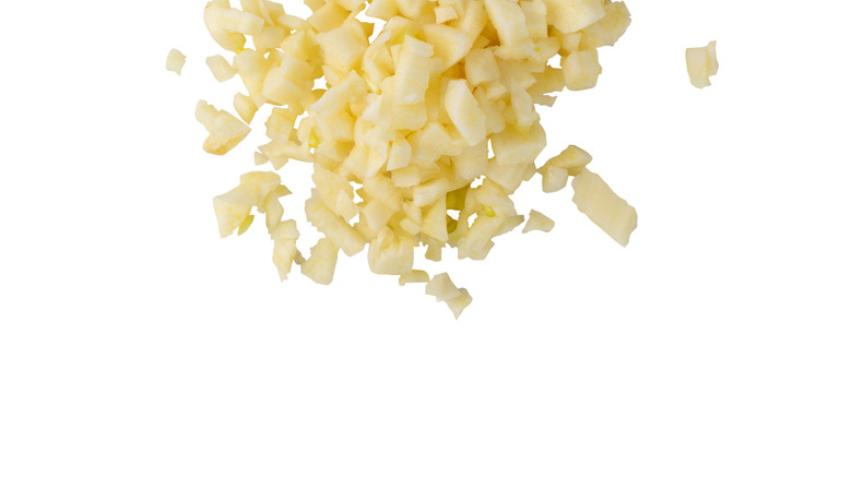 Minced garlic on white background