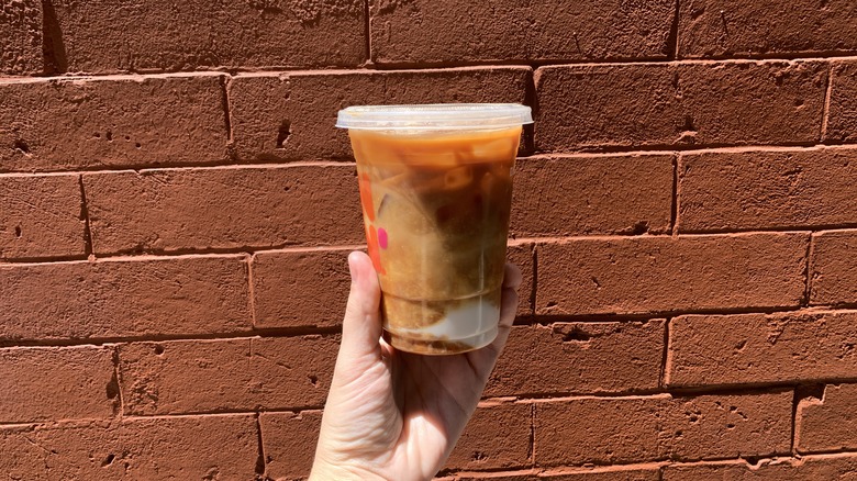 Dunkin Iced Macchiato red brick wall