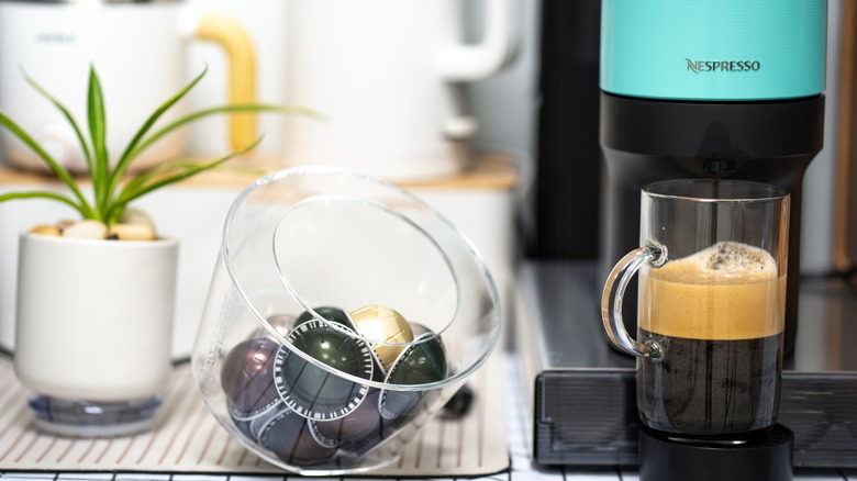 Nespresso machine making coffee