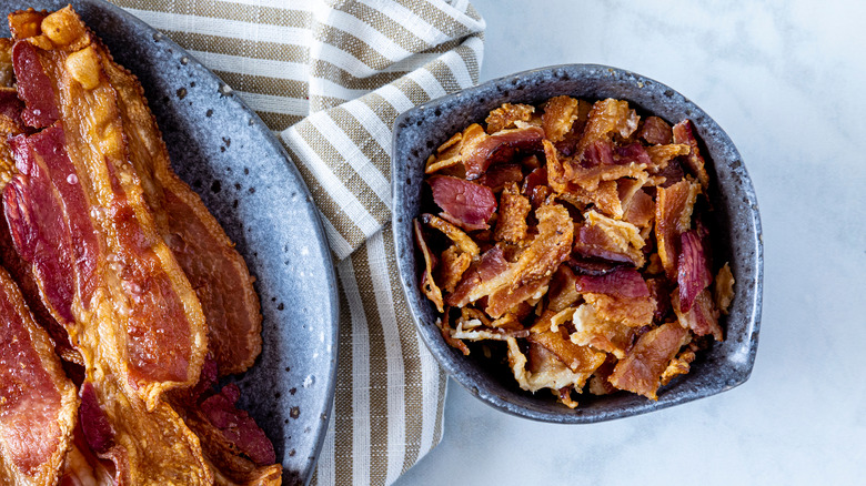 Bacon crumbles blue bowl light blue background