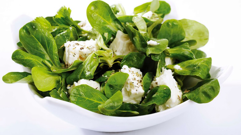 Spinach feta cheese salad white bowl