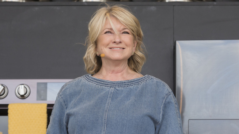 Martha Stewart smiles during a cooking demo