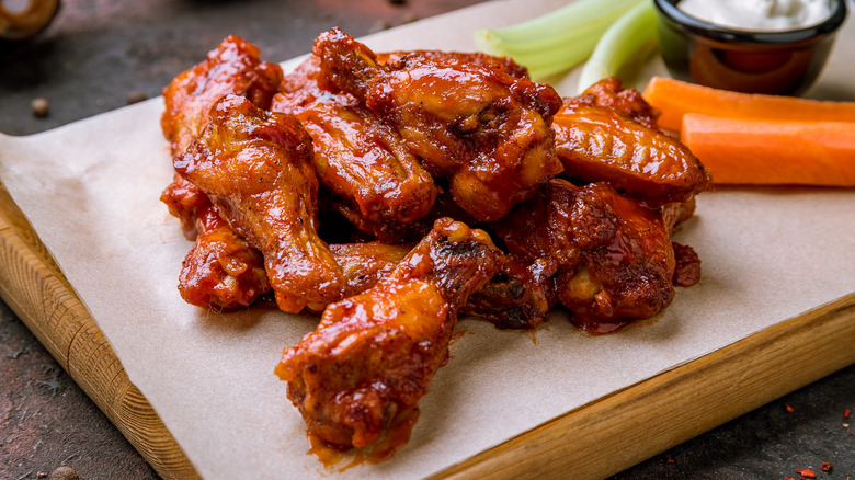 chicken wings on cutting board