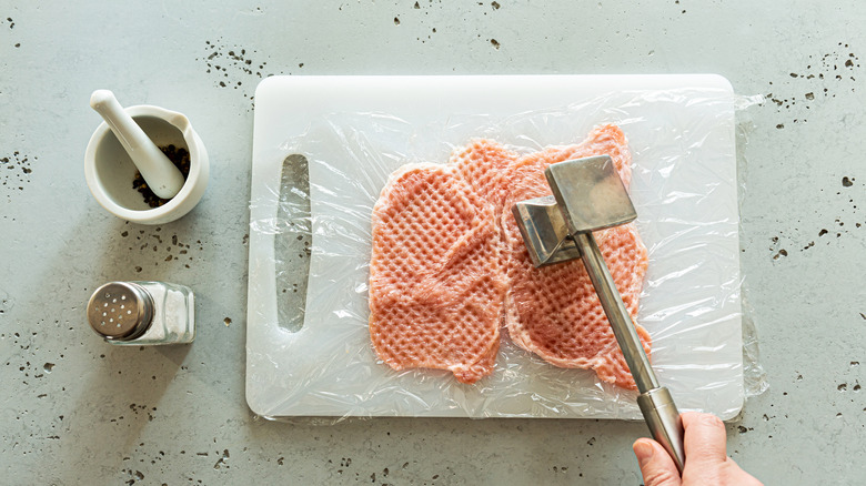 using a meat mallet 