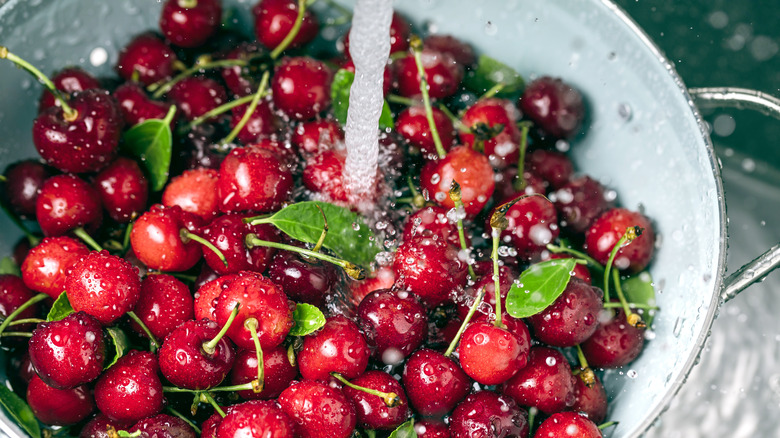 Running water over cherries