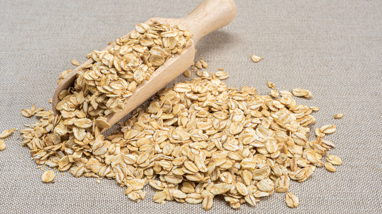 Pile and scoop of oats