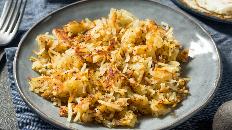 crispy hash browns on plate