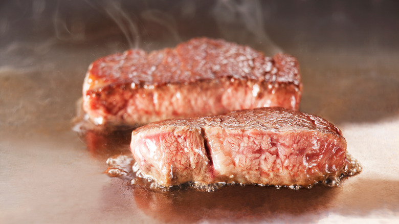 seared steak on griddle