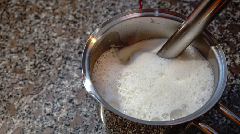 frothing milk with blender