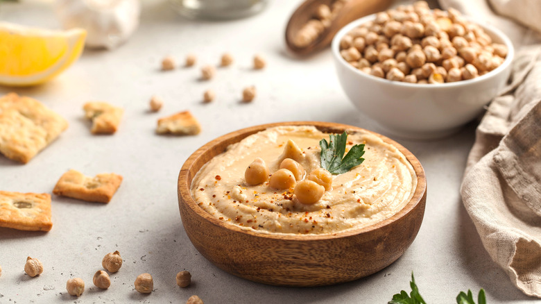 bowl of hummus and ingredients 