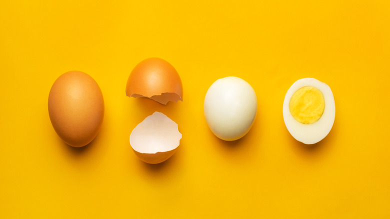 Hard boiled egg on yellow background