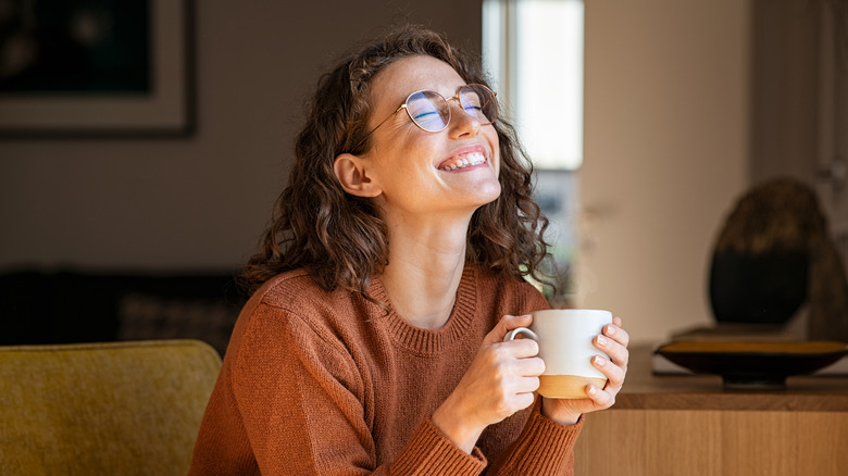 Happy girl with coffee