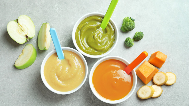 colorful bowls of baby food 