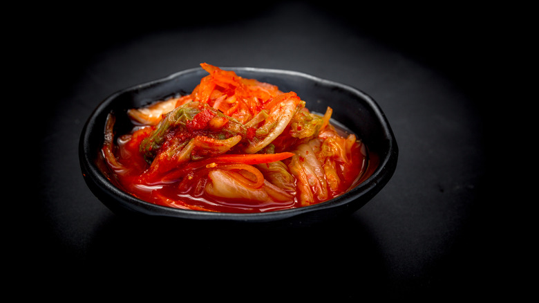 kimchi in black bowl 