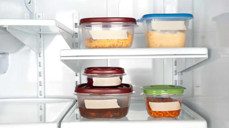 containers of leftovers in fridge