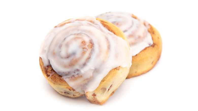 two frosted cinnamon rolls