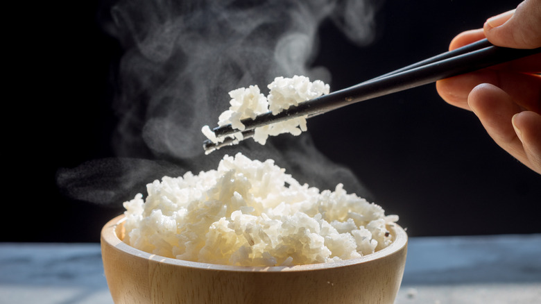 Steamed rice with chopsticks