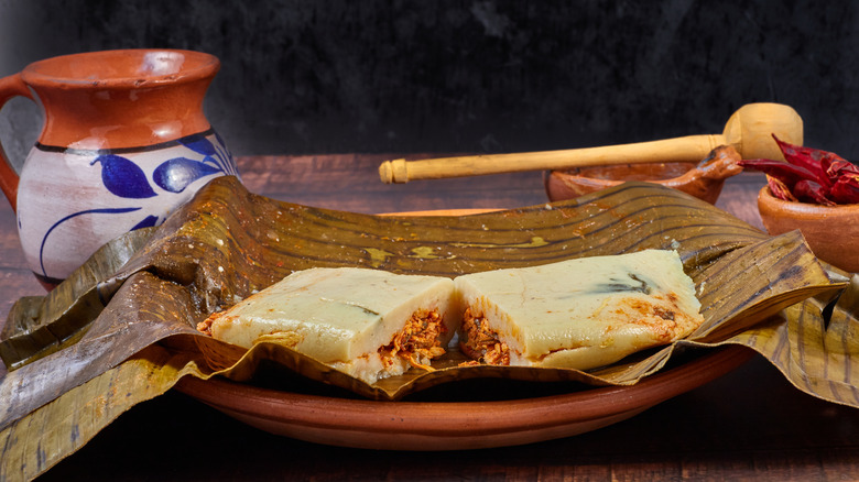 Tamal in a banana leaf wrapping