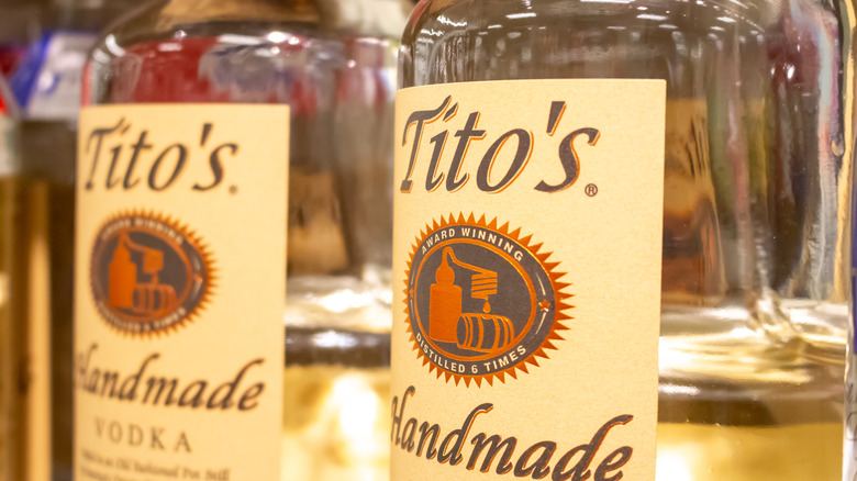 two Tito's bottles on shelf 