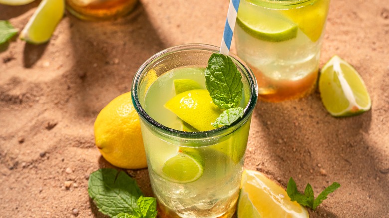 Lime lemonade in glasses with straws