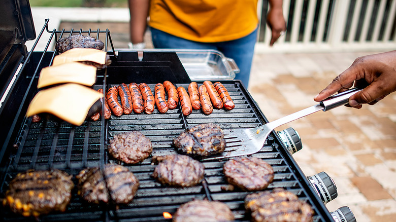 Burgers and hot dogs on grill