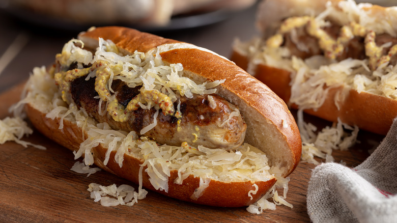 Bratwurst on a bun with mustard