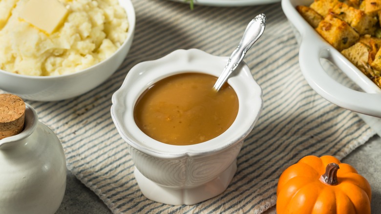 thanksgiving spread featuring turkey gravy