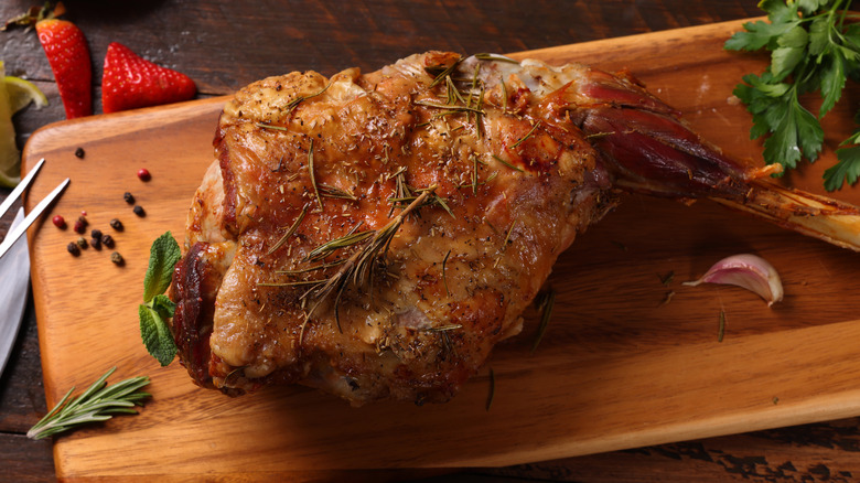 Roast lamb on cutting board