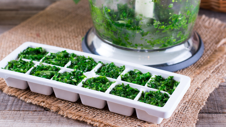 chopped parsley in an ice tray