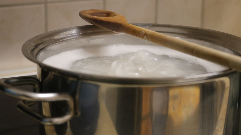 pot boiling water spoon