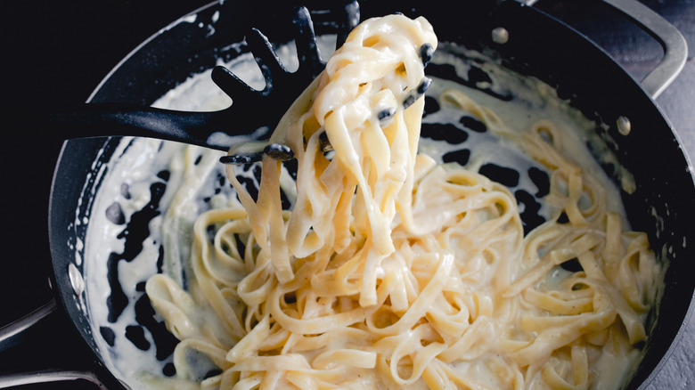 fettuccine alfredo in sauté pan