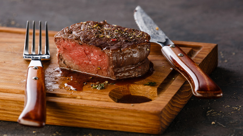 filet mignon on cutting board