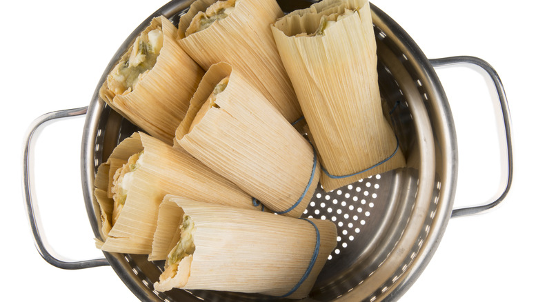 tamales in steamer basket