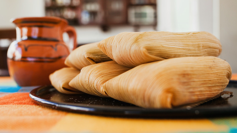 tamales stacked on plate