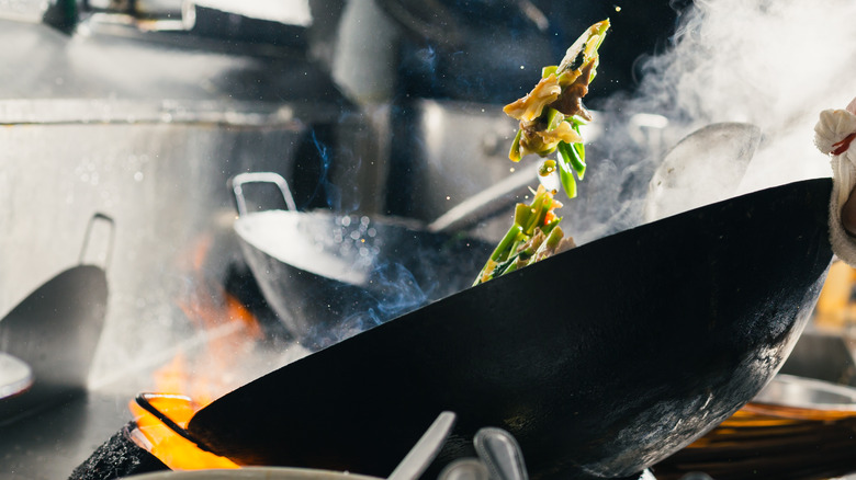 Stir-fry in a hot wok 