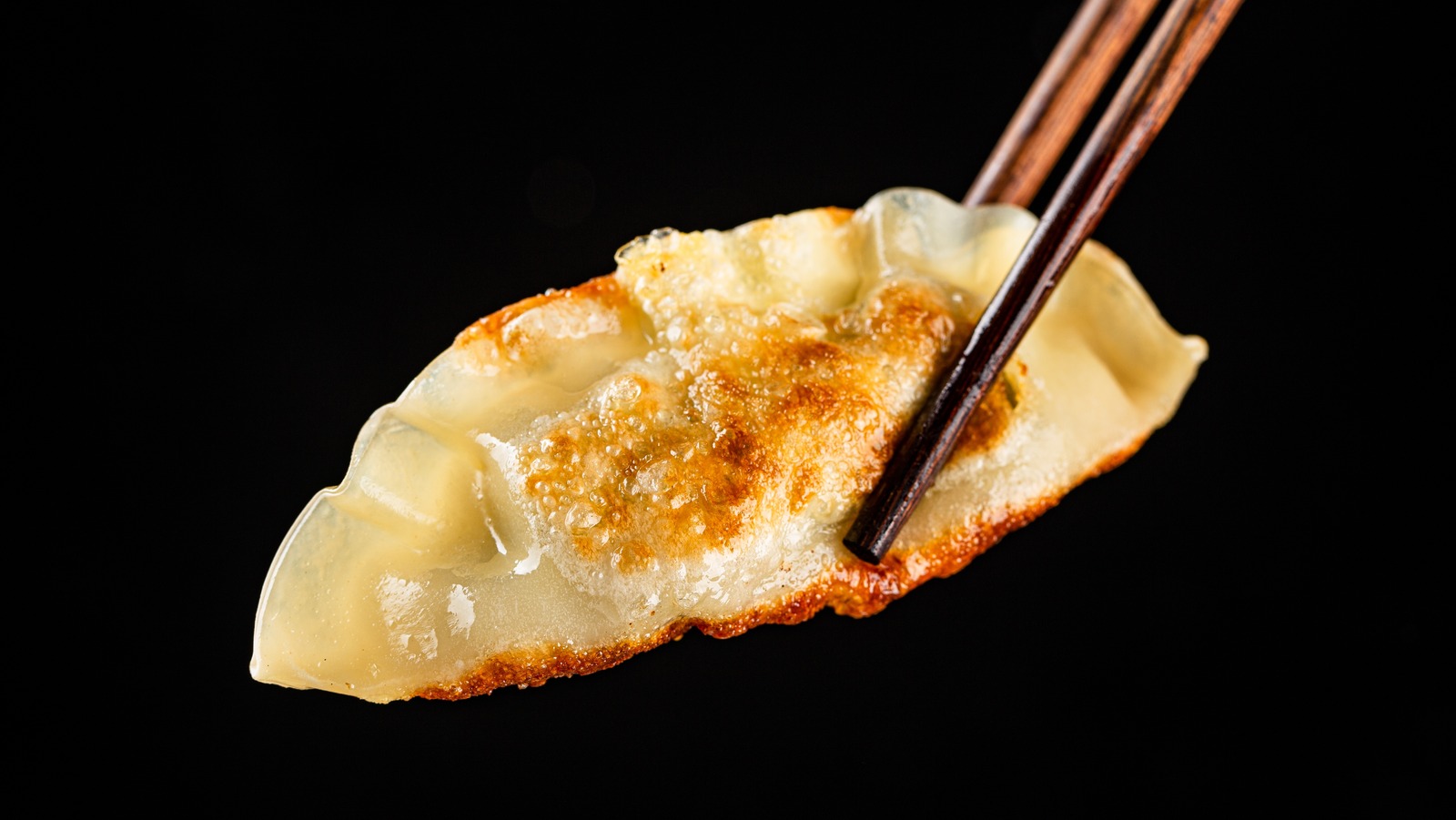 https://www.tastingtable.com/img/gallery/the-absolute-best-ways-to-upgrade-your-frozen-dumplings/l-intro-1699545760.jpg