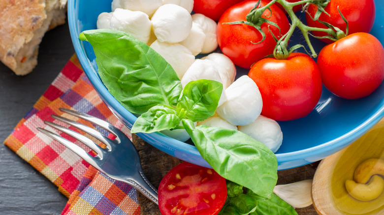 basil mozzarella and tomatoes in bowl