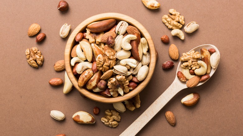 mixed nuts in wooden bowl