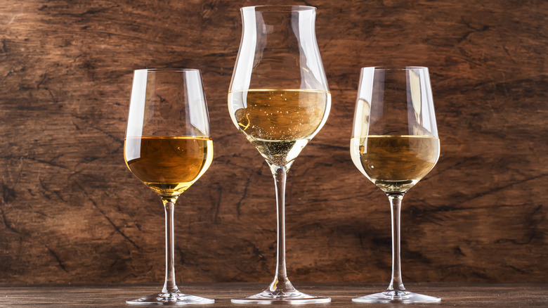 three dessert wine glasses