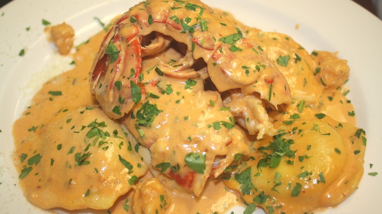 Lobster ravioli with lobster tail