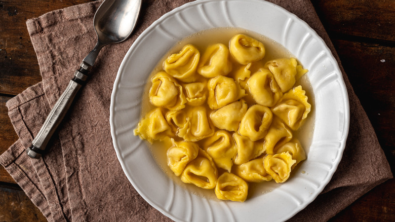 Bowl of tortellini en brodo soup