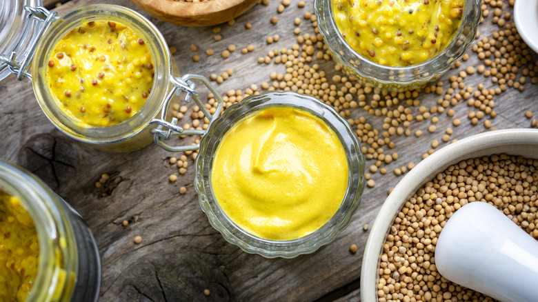 yellow mustard in jars