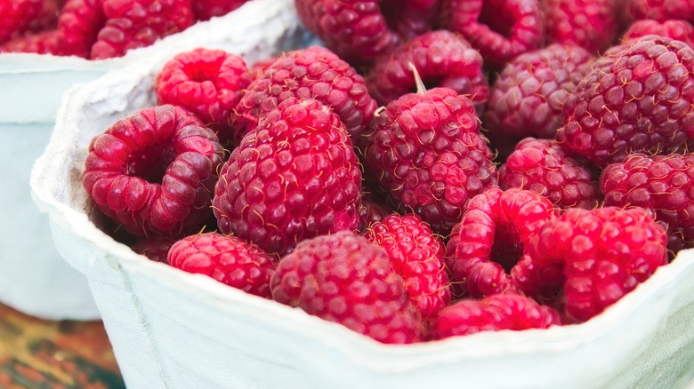 Raspberries in container