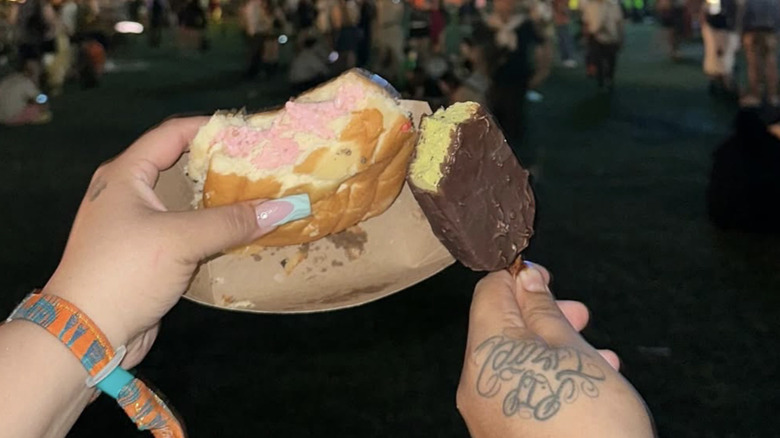 hands holding ice creams at Coachella