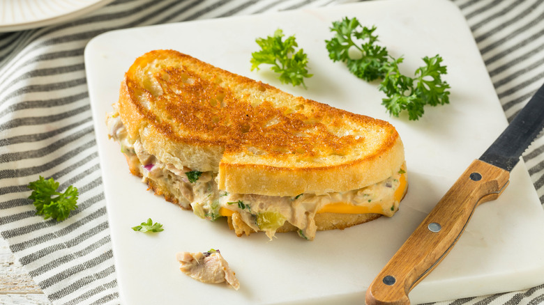 Tuna melt on cutting board