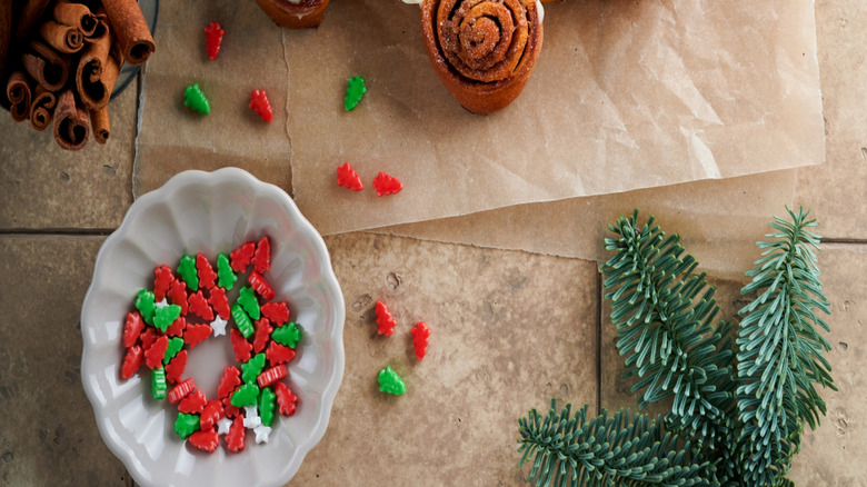 A cinnamon roll tree on a baking sheet